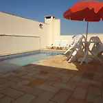 LINDO APTO ACONCHEGANTE, PISCINA, AR CONDICIONADO e SACADA GOURMET NO ITAGUA